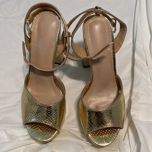 Gold high heels